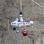 Load image into Gallery viewer, Aeroplane with hanging Santa
