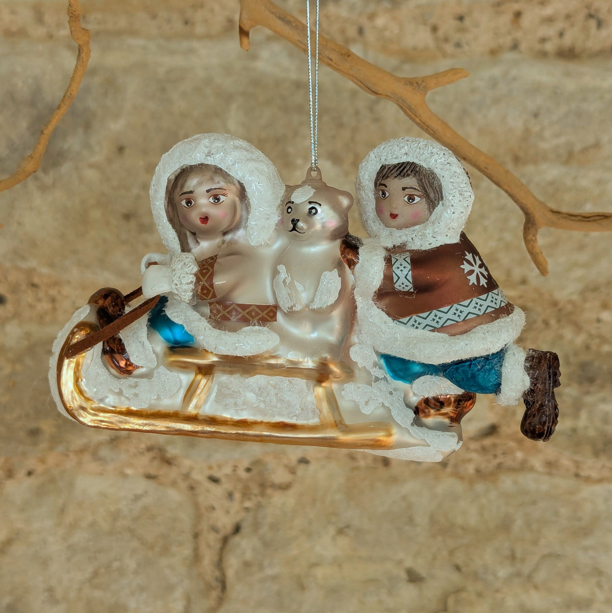 Inuit Kissing and Sledging in the Snow Glass Decoraton