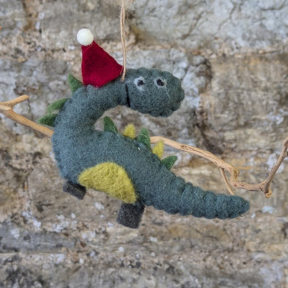 Felt Dino wearing a Santa Hat